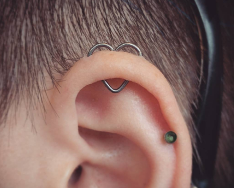 Tendencia piercing forma de corazón