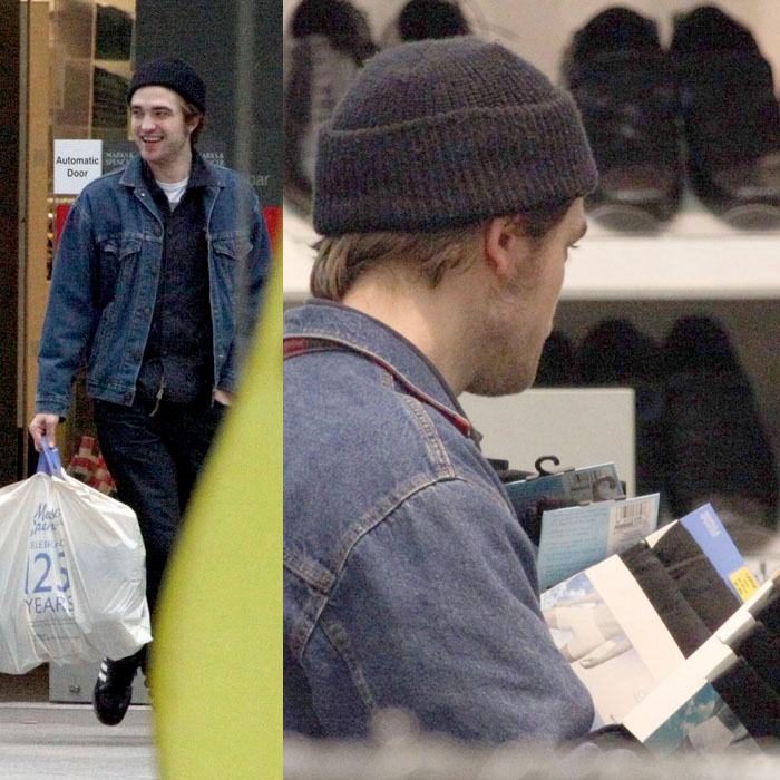 Robert Pattinson sale de una tienda cargado de calzoncillos