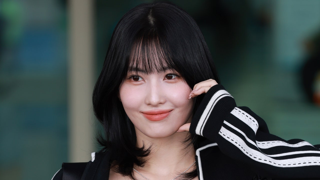 Nunca supe que necesitaba a Momo de TWICE cubierto de tatuajes